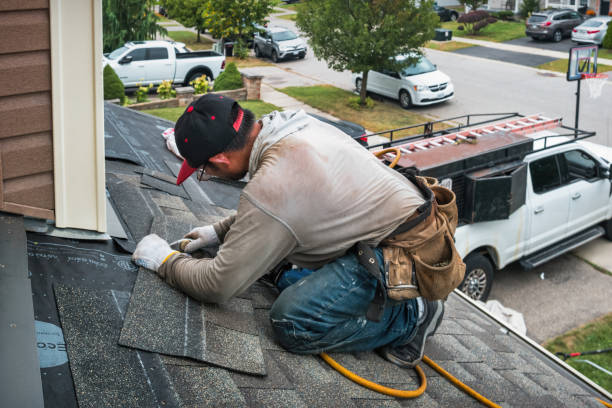 Professional Roofing technician working in Victoria, IL